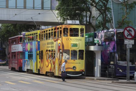 De bekende smalle en hoge dubbeldeks trammetjes van Hong Kong