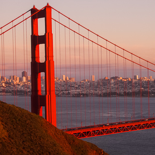 sunset at the golden gate bridge with downtown SF as backdrop (photo by sylvia)