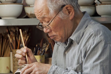 Deze meneer beschilderd met de hand kommetjes