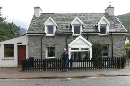 Syl bij een huisje in Glen Coe